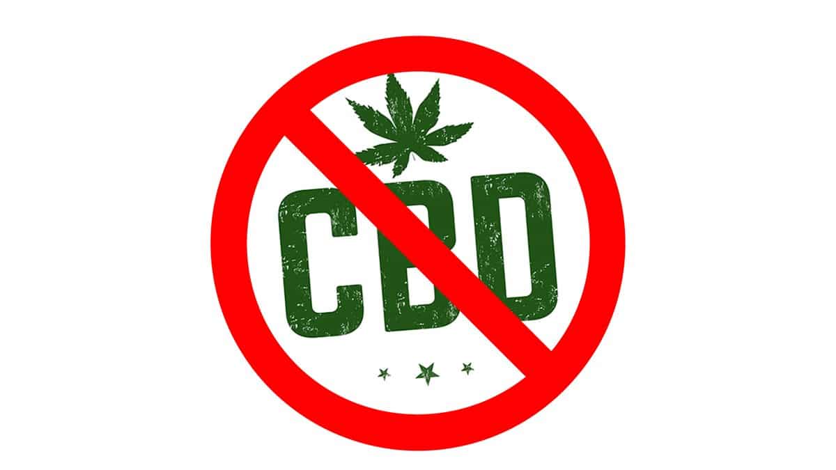 CBD crossed out with a red prohibition symbol and cannabis leaf above the letters